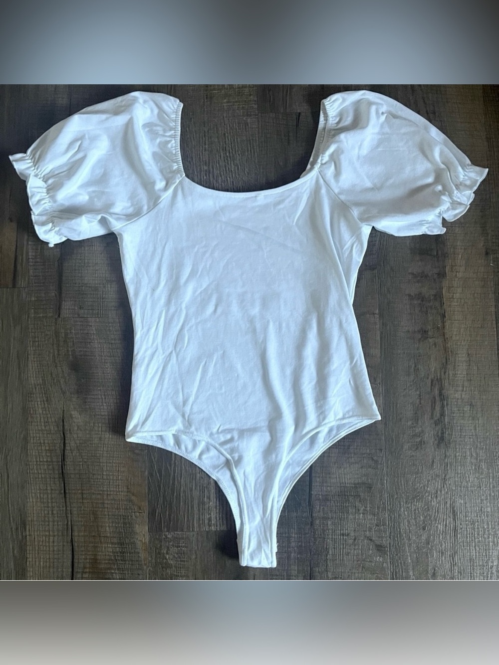 White Puff Sleeve Bodysuit with Scoop Neckline. Women’s size Large